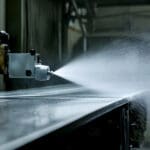 Expert Spraying Coating on Metal Surface in Factory